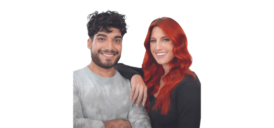 Couple, women with red hair and male with short black hair