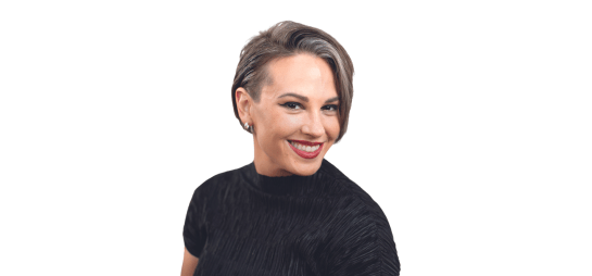 Woman with pixie cut silver and black hair