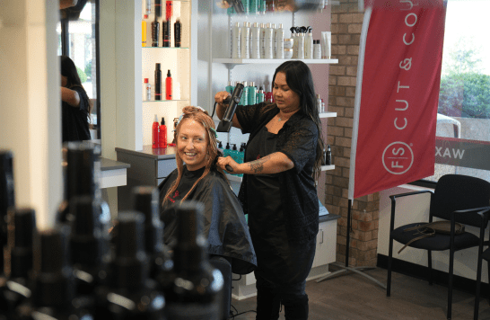 Client and stylist at chair